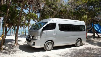 Gray van used for tour transportation